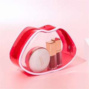 Sacs cosmétiques transparents imperméables en PVC pour femmes, sac à rouge à lèvres mignon en forme de lèvres rouges, sac de rangement portable pour le maquillage de voyage - Product Image 1