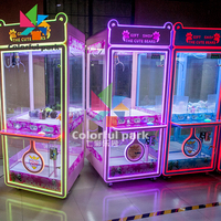 Machines colorées de jeux d'arcade de parc monnayeur/machine de griffe de grue de jouet à vendre/distributeur automatique