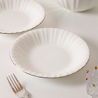Fournisseur chinois de services de table de luxe modernes en porcelaine fine à incrustations dorées, 12 pièces, vente en gros
