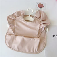 Bavoir pour bébé le plus populaire imperméable et écologique Style mignon Pu alimentation Bandana bouton jetable impression lavable bavoirs pour bébé manger