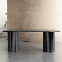 Table à manger moderne en marbre à double piétement rainuré, table de dîner en pierre massif Ellipse pour intérieur résidentiel haut de gamme