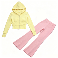 Ensemble de survêtement zippé surdimensionné pour femme avec patch brodé côtelé personnalisé de haute qualité et pantalon évasé – Tenue d'intérieur hivernale