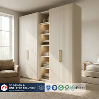 Système de placard modulaire intégré de style crème moderne pour chambre à coucher avec éclairage LED intégré et coins de sécurité arrondis