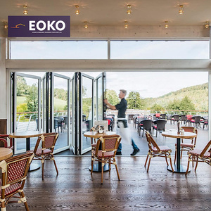 Porta Pieghevole in Vetro e Alluminio Certificata CE EOKO per Trattorie e Osterie Italiane con Vista sul Montagna - Product Image 1