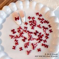 50 pièces/sac Breloques pour ongles en résine, motifs nœuds et rubans, mélange rouge, accessoires de décoration pour nail art, fournitures pour ongles