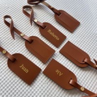 Étiquette de bagage personnalisée en cuir PU lisse avec logo en relief doré, étiquette de voyage miniature mignonne avec quincaillerie dorée