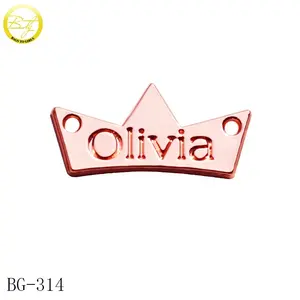 Custom small engraved logo metal tags crown shape rose gold garment metal plate for baby clothes