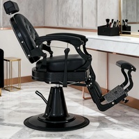 Fauteuil de barbier vintage en acier avec pompe hydraulique professionnelle, repose-pieds réglable et siège en cuir véritable - rétro