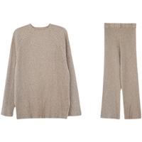 Ensemble tricoté ample personnalisé 2025 printemps nouvelle mode pour les femmes: pull à fente de couleur unie et pantalon à jambes larges ensemble deux pièces