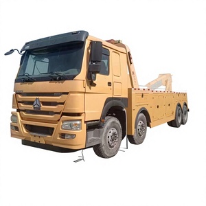 รถบรรทุกพ่วงแบบพื้นเรียบ Howo พร้อมระบบวินซ์ไฮดรอลิกและปั๊ม - Product Image 1
