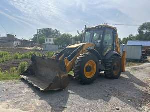 Chargeuse-pelleteuse JCB 4CX 4X14 d'occasion, 7000 kg, 2001-4000 heures, avec composants essentiels (moteur, pompe, boîte de vitesses, roulement) à vendre à bas prix - Product Image 4