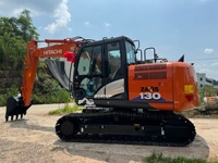Excavatrice sur pneus d'occasion Hitachi ZX 130 de 13 tonnes, 98% neuve, excellente qualité, en stock