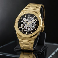 Fournisseur en gros de montres mécaniques personnalisées, cadran squelette doré, bracelet en acier inoxydable givré, montre-bracelet OEM/ODM en gros.
