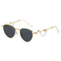 Lunettes de soleil rétro ovales en métal pour femmes, branches ornées de cristaux, protection UV400, élégantes, vente en gros, logo personnalisé