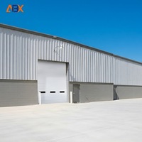 Porte sectionnelle industrielle moderne multifonctionnelle en acier isolée, coupe-vent, automatique, en polymère, haute performance pour hôpital