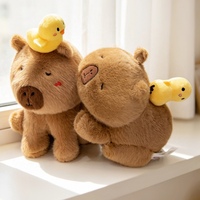 Peluche Capybara Moelleuse et Douce, Assise ou Allongée, avec Mini Canard et Étoile Décorative, Idéale pour Cadeau d'Anniversaire pour Enfants