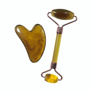 Juego de piezas de gua sha en forma de corazón color ámbar, masajeador facial de doble rodillo - Product Image 2