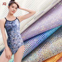 Stock de lots de verre sattré brillant hologramme irisé feuille métallique tissu poly spandex extensible dans les 4 sens jupe de danse tissu de maillot de bain