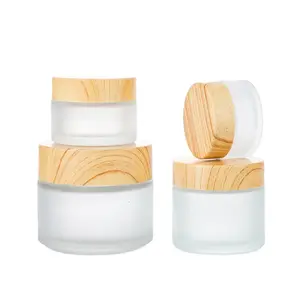 Envase cosmético personalizado de lujo vacío 30g 50g 100g Frosted Scrub Body Butter Glass Cream Jar con tapas de Bambú