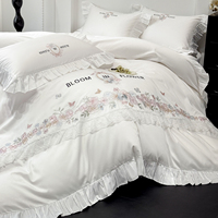 Ensemble de literie en coton de style princesse française 4 pièces avec broderie florale et volants en dentelle