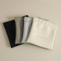 Sac en cuir Pu personnalisé avec impression en relief à presser pour rangement de pièces de monnaie bijoux pochette à bijoux en cuir avec aimant de fermeture
