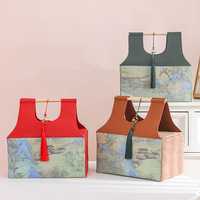 Sac de luxe en cuir PU avec poignée et pompon, idéal pour l'emballage de cadeaux du Ramadan, du Nouvel An chinois et des fêtes.