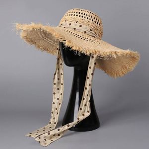 2025 New Korean Style Women Sombrero Hat Hollow Raffia Straw Hat Wide Brim Casual Seaside Beach <b>Sunscreen</b> Floppy Hat - Product Image 1