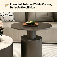 Table basse moderne de style français avec plateau en marbre crémeux et structure en métal aux coins arrondis - Design durable et respectueux de l'environnement