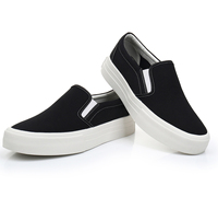 Baskets en toile blanches et noires unies, style slip-on, pour hommes et femmes, idéales pour la marche (OEM)