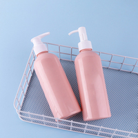 Vente en gros de 200ml de contenants de cosmétiques à épaulement rond en PET rose personnalisé Échantillon gratuit de bouteilles de lotion en plastique