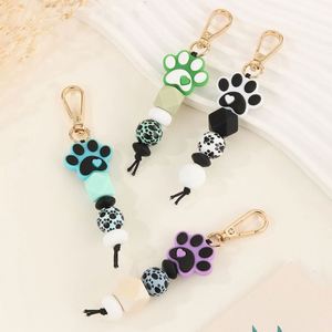 Silicone Cat Paw Beaded <b>Keychain</b> Fluffy Pom-Pom Wood Beads Handcrafted Light Keyring Accessory with Woven Technique - Product Image 6