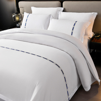 Parure de lit d'hôtel imprimée réactif haute densité 4 pièces, luxe, avec décoration en ruban tissé, housse de couette et linge de lit