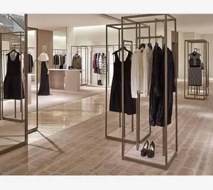 उच्च अंत कपड़े की दुकान इंटीरियर डिजाइन के साथ प्रदर्शन स्थिरता कपड़े की दुकान सजावट धातु प्रदर्शन रैक