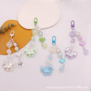 Nouveau porte-clés de voiture Q1242 en acrylique électroplaqué, moderne et minimaliste, avec nœud coloré, pendentif, accessoires de sac perlés aux couleurs vives et fraîches - Product Image 2