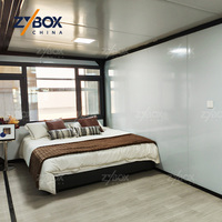 Casa Contenedor Expandible ZYBOX de 40 pies, con Energía Solar, Fuera de la Red, Cargador para Vehículos Eléctricos, Almacenamiento de Baterías, Agua Caliente, ADU, Casa Prefabricada Inteligente