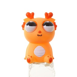 Jouets à presser en vinyle amusants avec yeux qui sortent, en forme de <span class=keywords><strong>dragon</strong></span> ou de dinosaure - Billes créatives et farfelues pour soulager le stress, jouets anti-stress avec yeux d'animaux qui sortent - Product Image 1