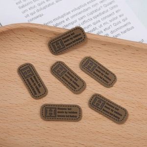 Étiquettes en cuir PU personnalisées avec logo en relief, à thermocoller, pour vêtements, vente en gros - Product Image 6