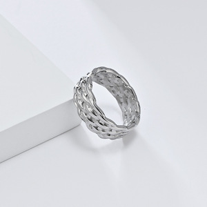 Unique, stylish, androgynous woven braided <b>titanium</b> steel <b>ring</b> for men and women, exuding sophistication and elegance. - Product Image 3