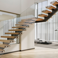 Rampe d'escalier flottante moderne en verre droit pour intérieur avec installation latérale en acier inoxydable et poteaux de fixation en verre