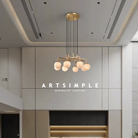 Lustre moderne en forme de sphère en albâtre naturel à branches multiples |   Luminaire suspendu LED en laiton doré réglable en hauteur pour salon