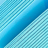 Tapis d'entraînement jetables imperméables SAP pour chiens, avec support adhésif pour placement fixe, antidérapants, meilleur prix fabricant