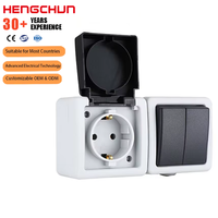 Interruptor de botón a prueba de agua IP54 1 Gang 2 Gang Enchufe de pared estándar europeo Material de PC ABS de alta calidad para exteriores