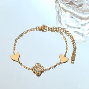 <span class=keywords><strong>Bracelet</strong></span> en acier inoxydable avec pendentif trèfle et pompon pour femme – Nouvelle collection, élégant et polyvalent – Composants de bijoux en gros - Product Image 1