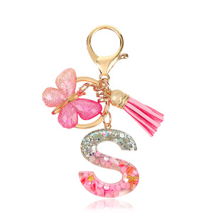 Llavero al por mayor con borla rosa, mariposa, copo de nieve de resina y letra inicial, para bolso, mochila, cartera, llavero con letra del alfabeto - Product Image 4