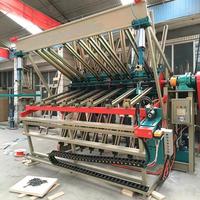 Machine à emboîter le bois massif à 14 rangées avec pince hydraulique et composatrice de bois rotative pneumatique