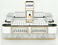 Luxuriöser Schwarz-Gold Parfüm-Präsentationsstand Hochwertige Maßgefertigte Vitrine Acryl Marmor-Finish LED Aluminium Langlebig für Einkaufszentren Einzelhandelsgeschäfte