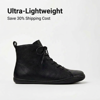 Bottes Chelsea minimalistes en cuir souple à bout large et talon plat pour hommes et femmes, personnalisables OEM ODM pour la ville et l'extérieur