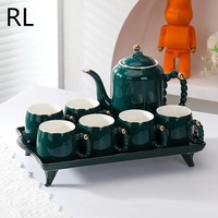 Ensemble de tasses à thé à poignée en perle très vendu, ensemble de thé de luxe léger avec bordure dorée, ensemble d'eau en céramique à glaçure perlée personnalisée et exquise