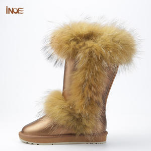 Botas de nieve de invierno OEM a la moda <span class=keywords><strong>para</strong></span> mujer, piel de vaca auténtica con forro de felpa sintética de mapache, planos impermeables antideslizantes - Product Image 2
