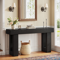 Table console moderne de luxe en bois massif noir avec cadre en tréteaux creux, profondeur réduite, meubles de salon